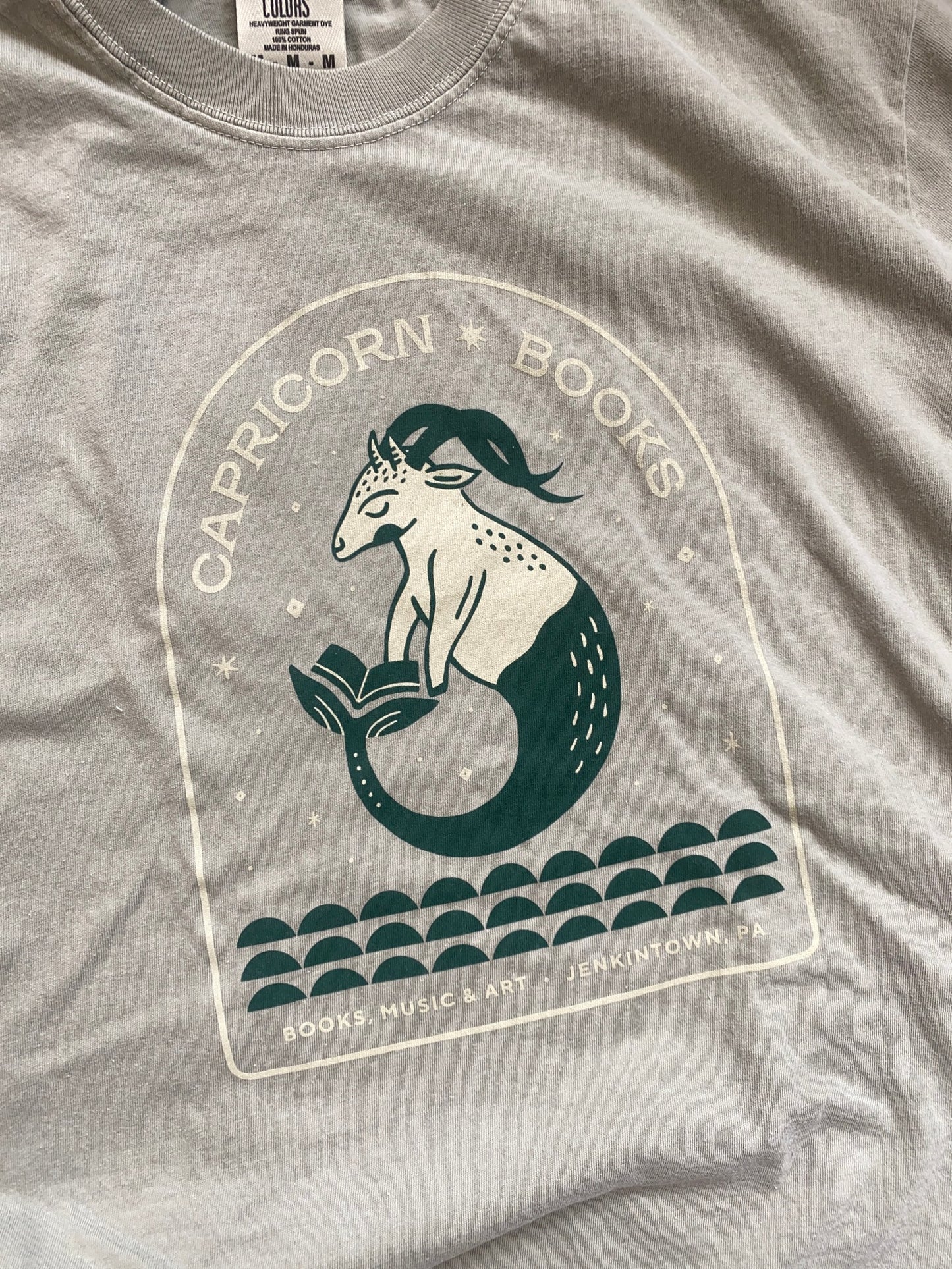 Land and She Capricorn Books Tee